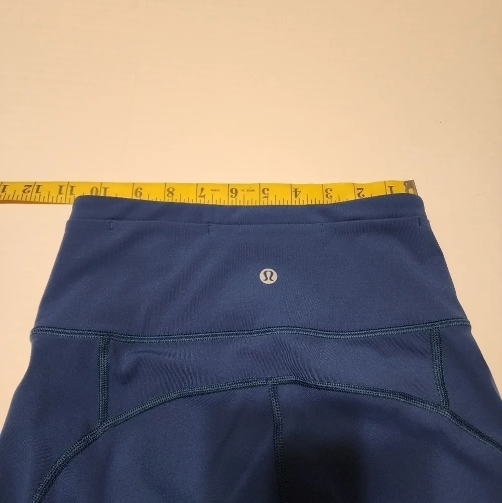 Lululemon size 2 Gear up blue Poseidon cropped leggings with sheer accents